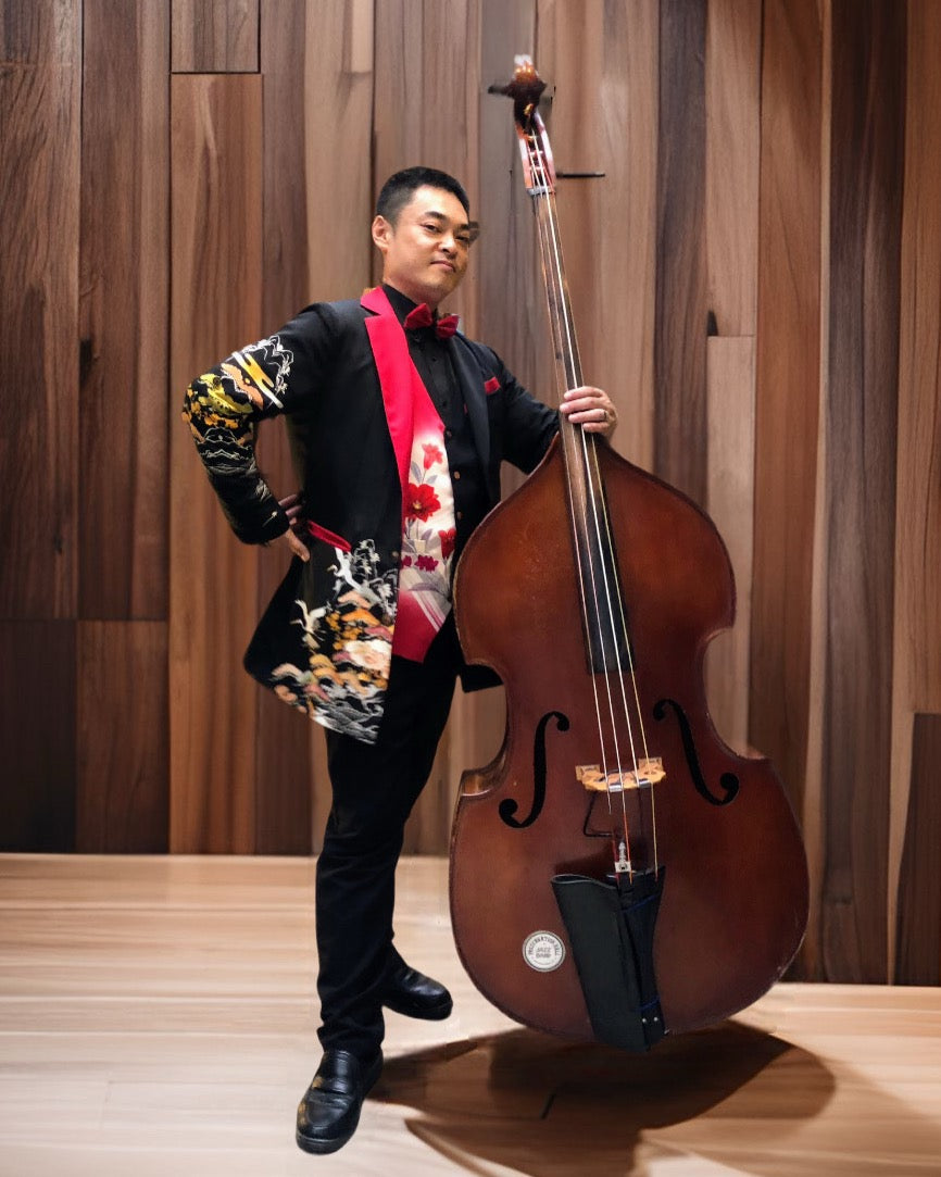 Musician performing while wearing a tailored TATZU kimono remake jacket.